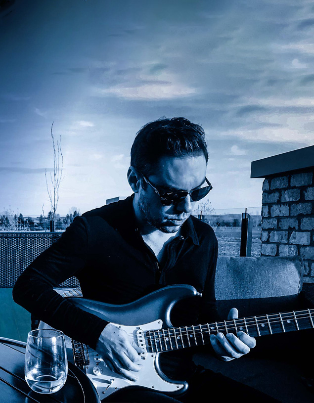 Aaron playing guitar